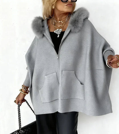 Veste à capuche élégante avec bordure en fourrure