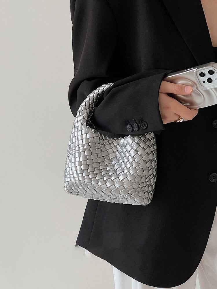 Petit sac à main tressé aspect doux