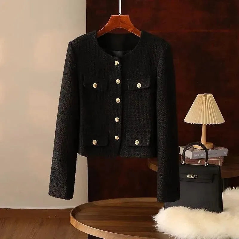 Veste féminine élégante avec de nombreuses poches style tweed