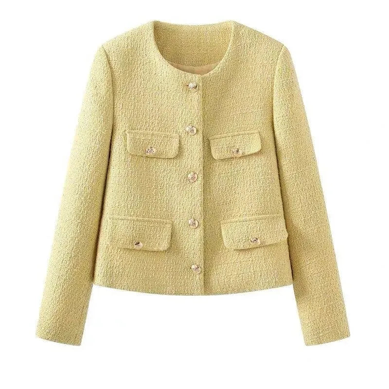 Veste féminine élégante avec de nombreuses poches style tweed