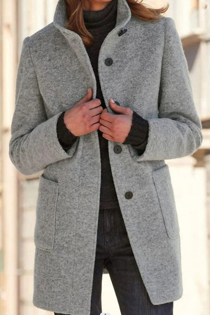 Élégante veste en laine col montant unie
