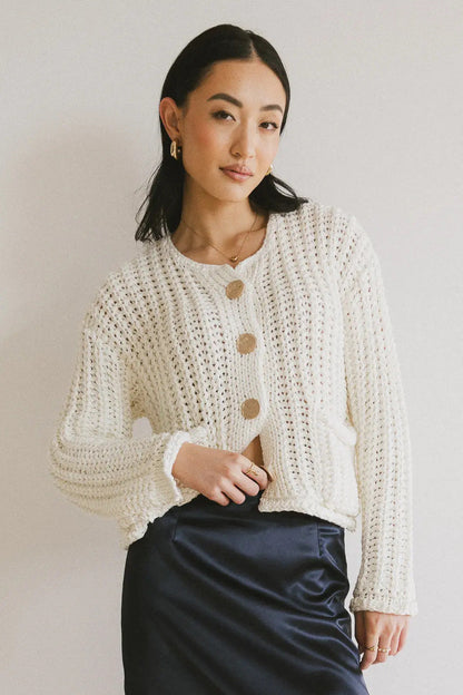 Cardigan élégant pour femme avec boutons et poches