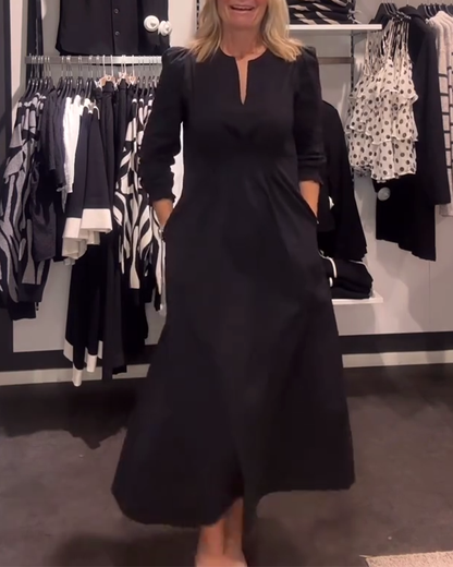 Élégante robe pour femme avec manches bouffantes et taille cintrée
