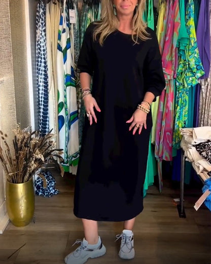 Robe élégante femme col rond tissu ferme