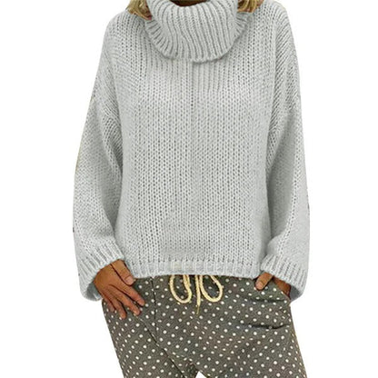 Grande robe oversize en grosse maille à col montant et ourlet côtelé