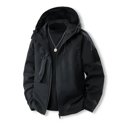 Veste d'extérieur imperméable à capuche et poches zippées