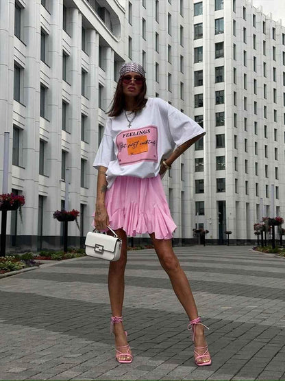 Mini-jupe courte taille haute avec ourlet à volants pour femme