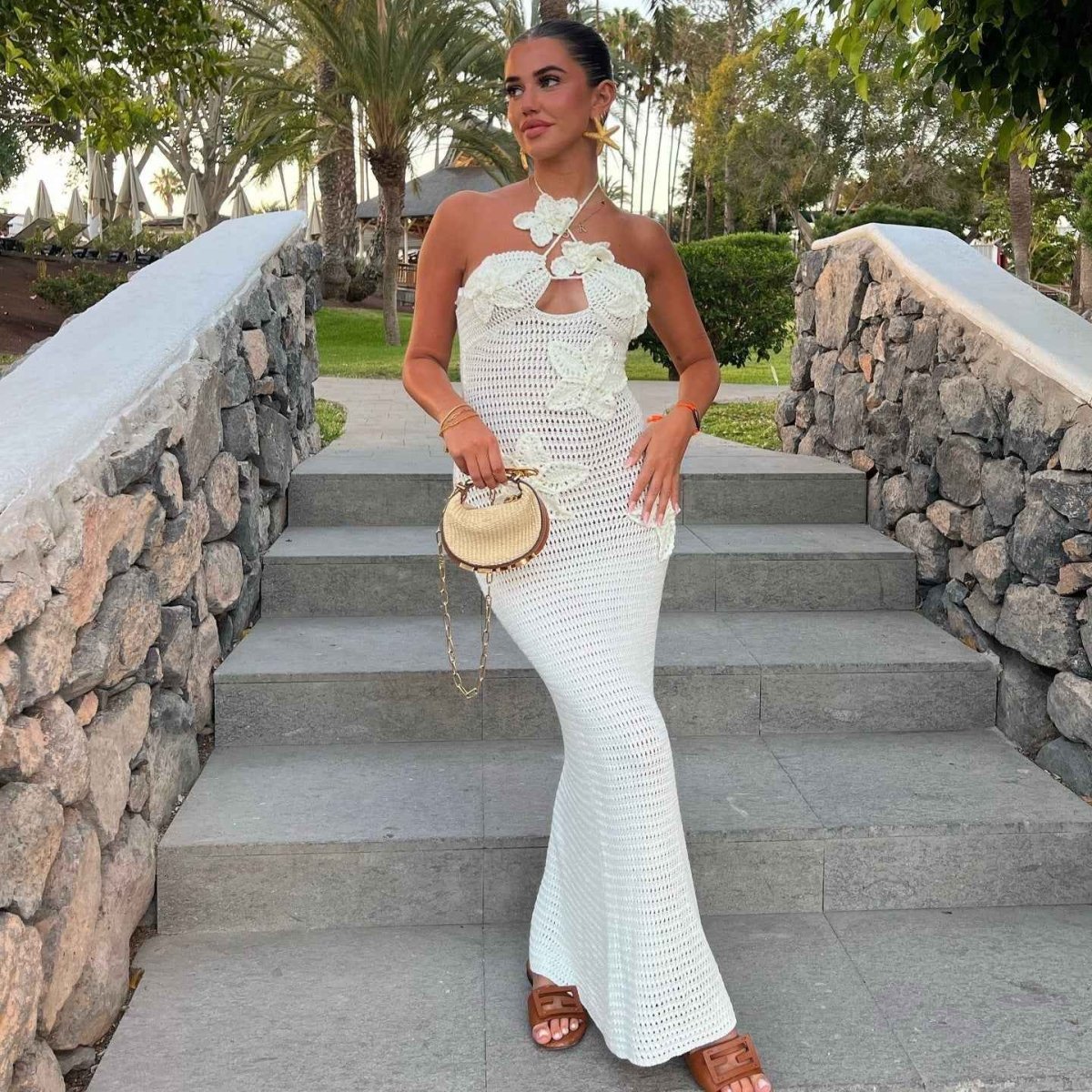 Robe longue au crochet fleurs 3D dos nu été