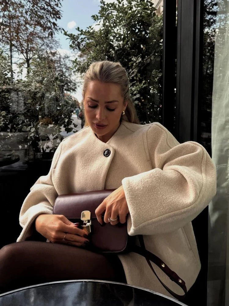 Manteau élégant à boutons pour femme