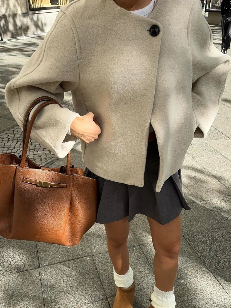 Manteau élégant à boutons pour femme