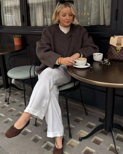 Manteau élégant à boutons pour femme