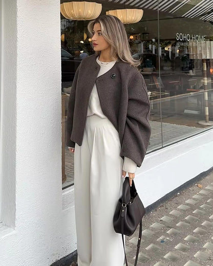 Manteau élégant à boutons pour femme