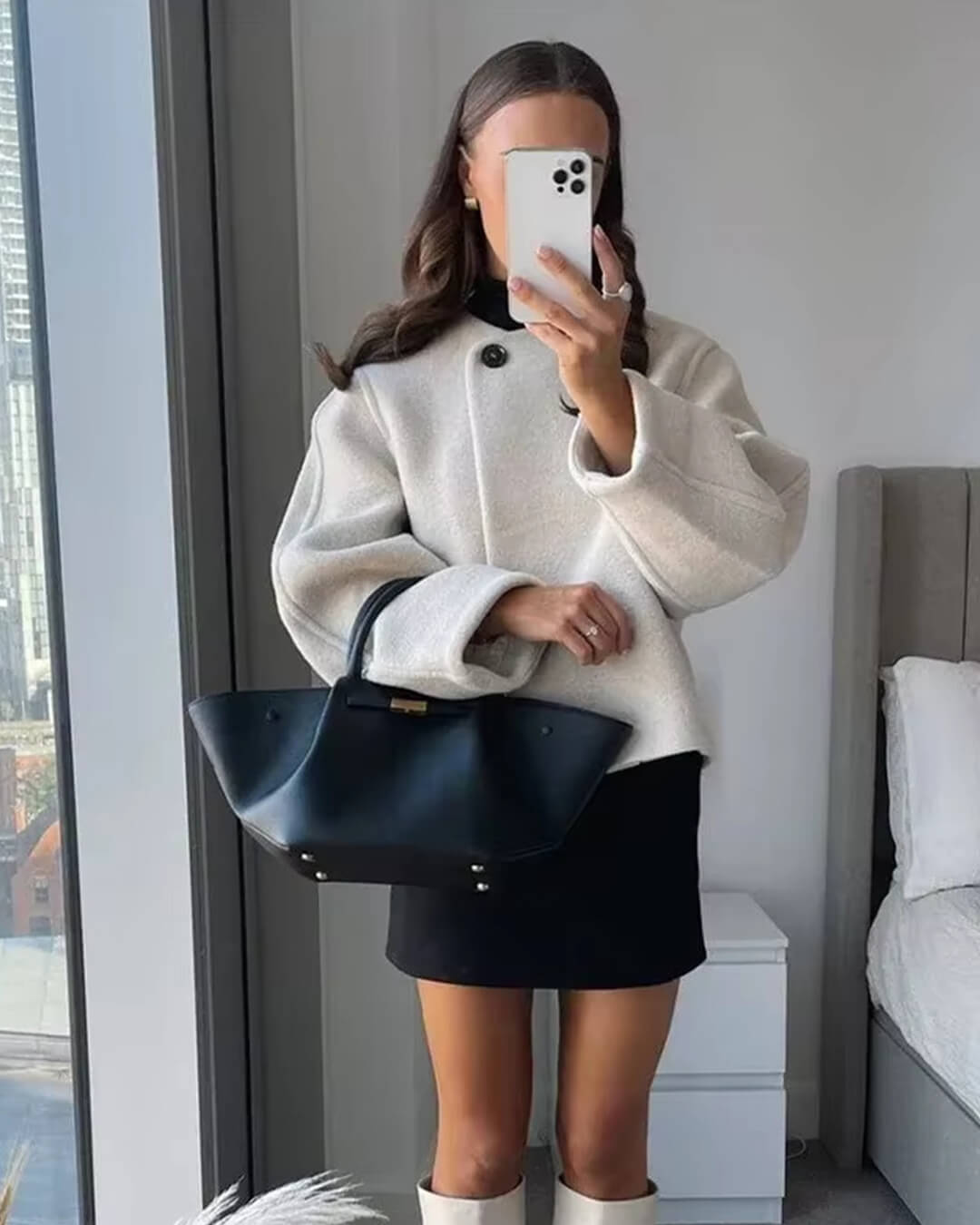 Manteau élégant à boutons pour femme