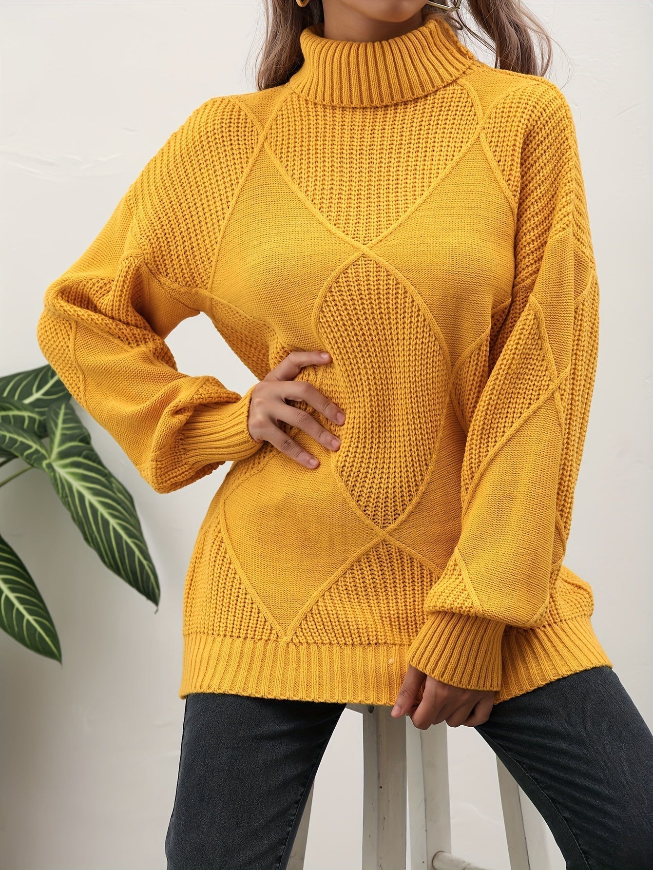 Pull uni col roulé tendance