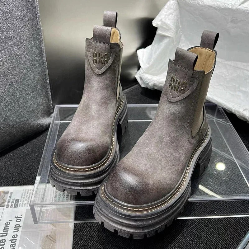 Bottes hautes en cuir à plateforme compensée pour femme