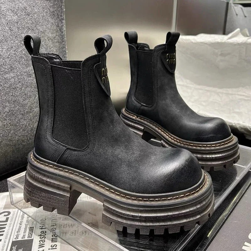Bottes hautes en cuir à plateforme compensée pour femme